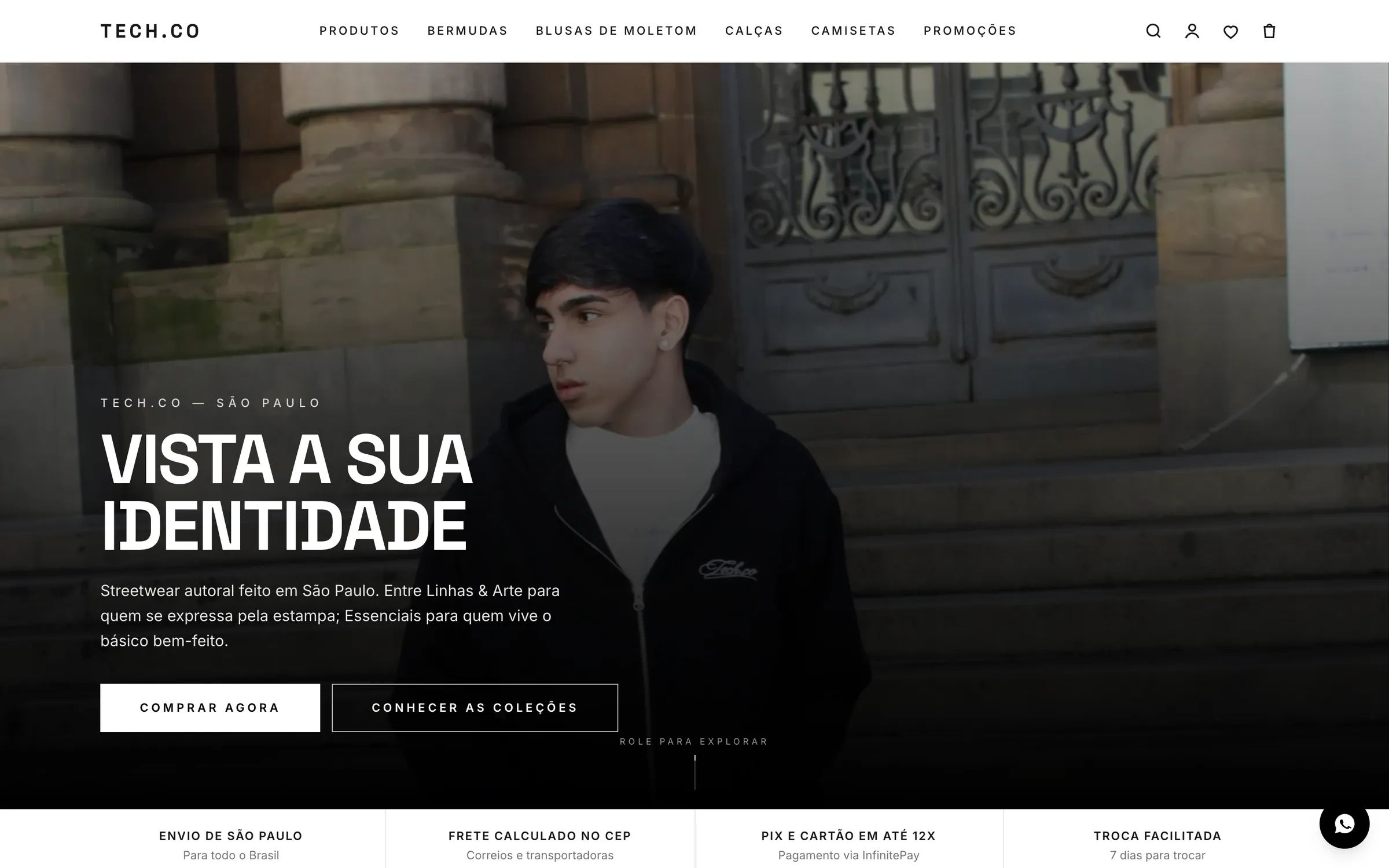 Topo da loja Tech.co em computador: “Vista a sua identidade” sobre a foto de um modelo de moletom preto, com o menu de categorias